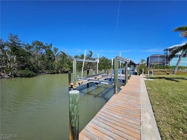 a view of a lake with a house