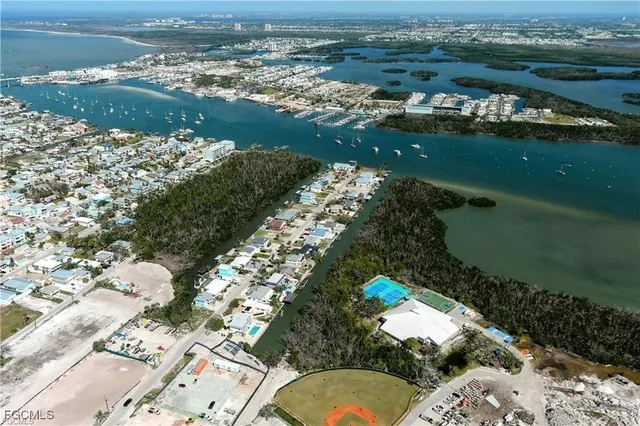an aerial view of lake residential house with outdoor space