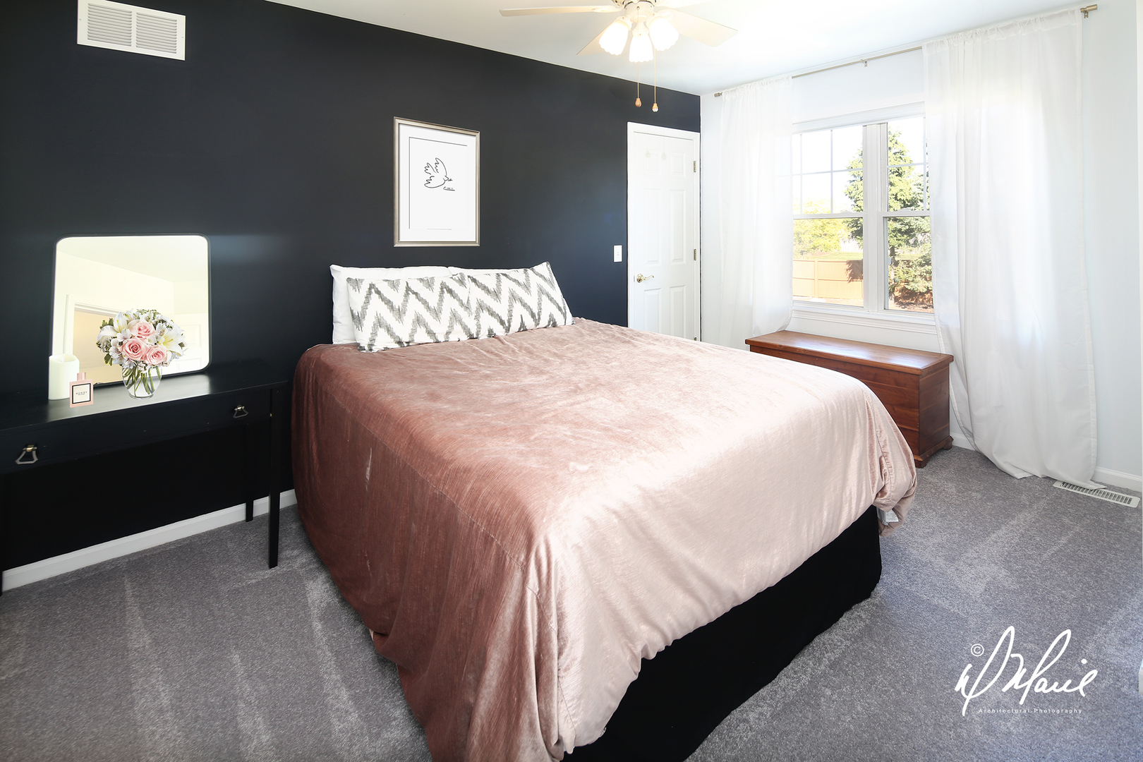 5047 Prairie Sage Lane Naperville, IL 60564 - Photo 17 of 22 a large bed sitting in a bedroom next to a window