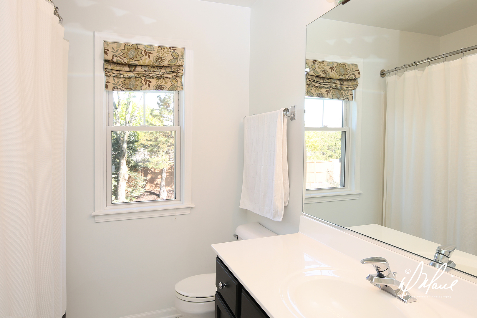 5047 Prairie Sage Lane Naperville, IL 60564 - Photo 19 of 22 a bathroom with a sink and a window