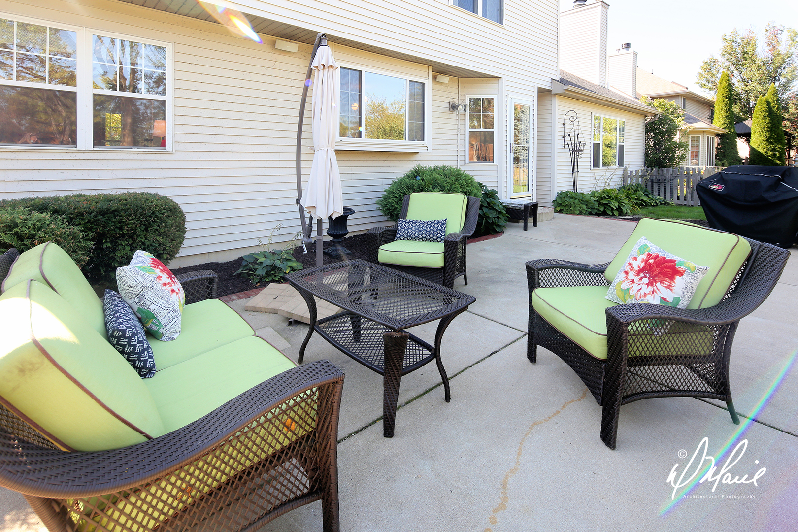 5047 Prairie Sage Lane Naperville, IL 60564 - Photo 21 of 22 a view of a patio with couches and a potted plant on a table