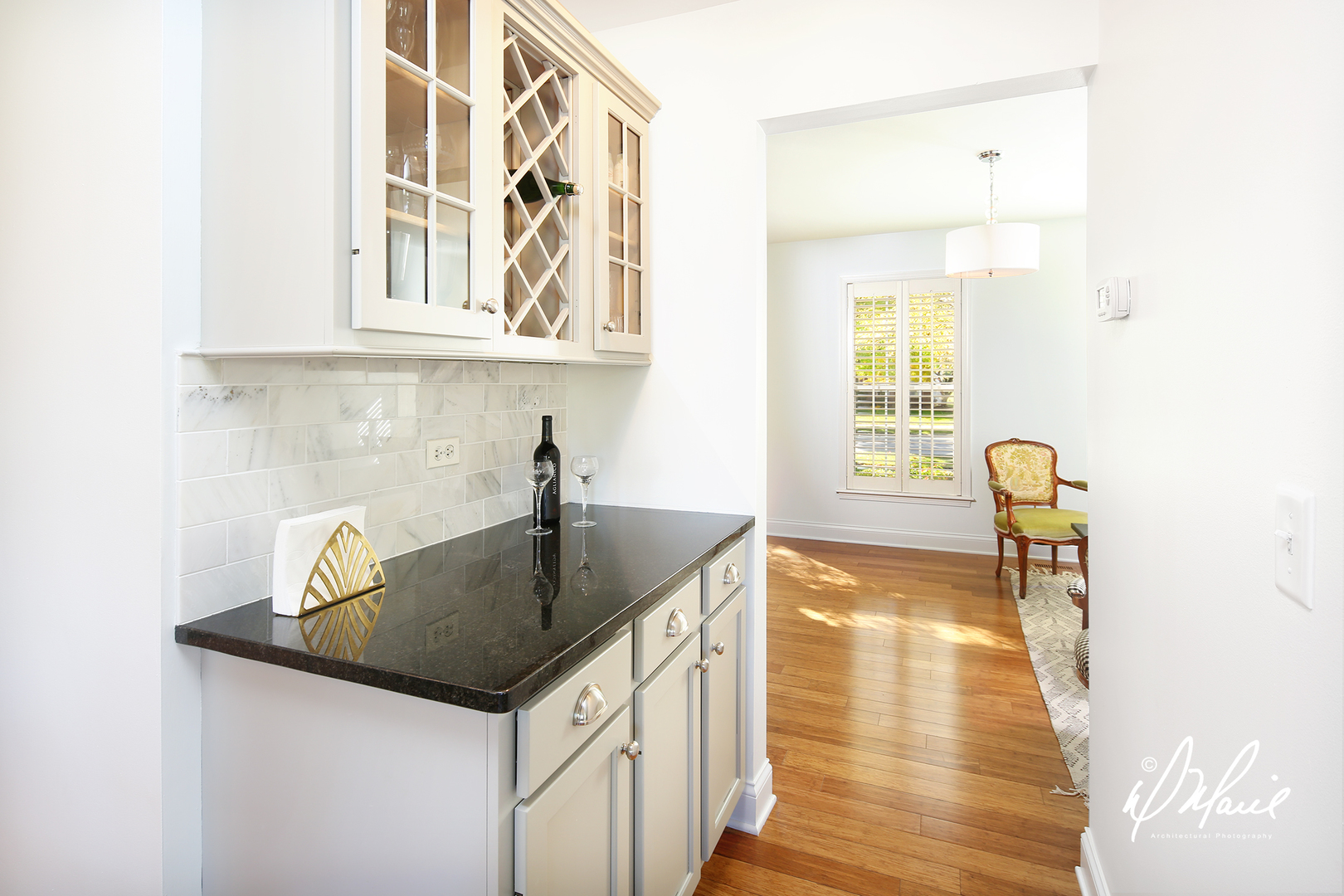 5047 Prairie Sage Lane Naperville, IL 60564 - Photo 9 of 22 a kitchen with a sink a counter space and wooden floor