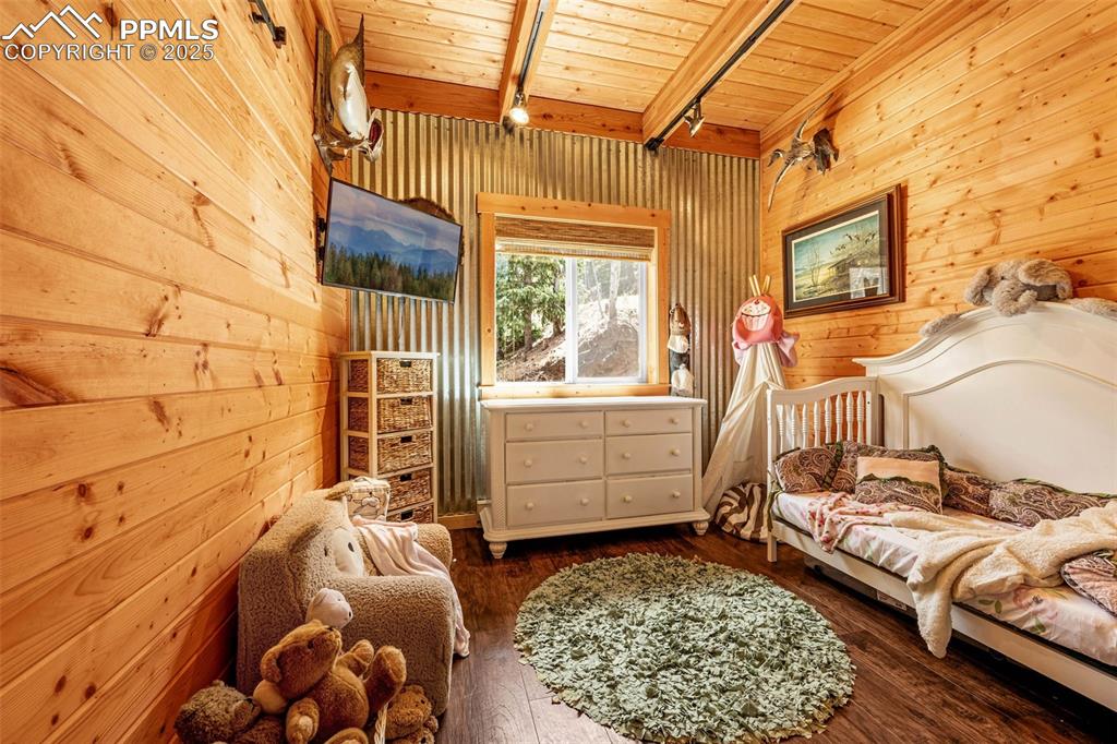 325 Willow Road Divide, CO 80814 - Photo 12 of 45 a bedroom with a bed and a window