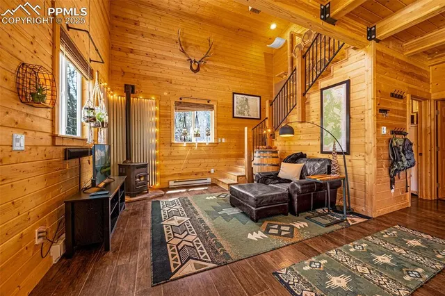 a backyard of a house with barbeque oven table and chairs