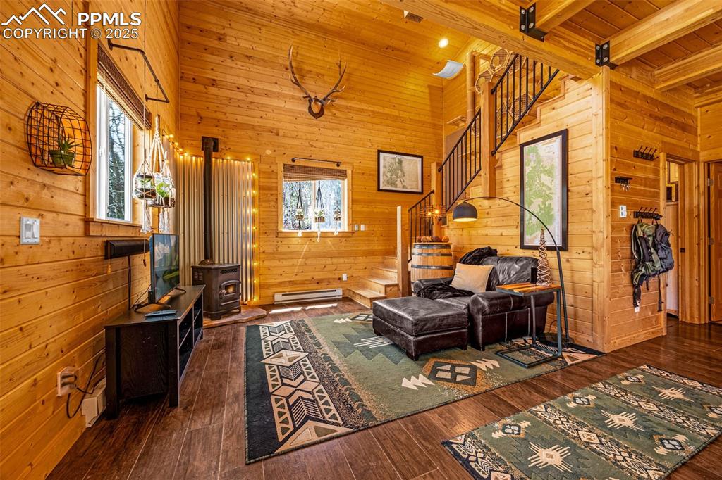 325 Willow Road Divide, CO 80814 - Photo 6 of 45 a backyard of a house with barbeque oven table and chairs