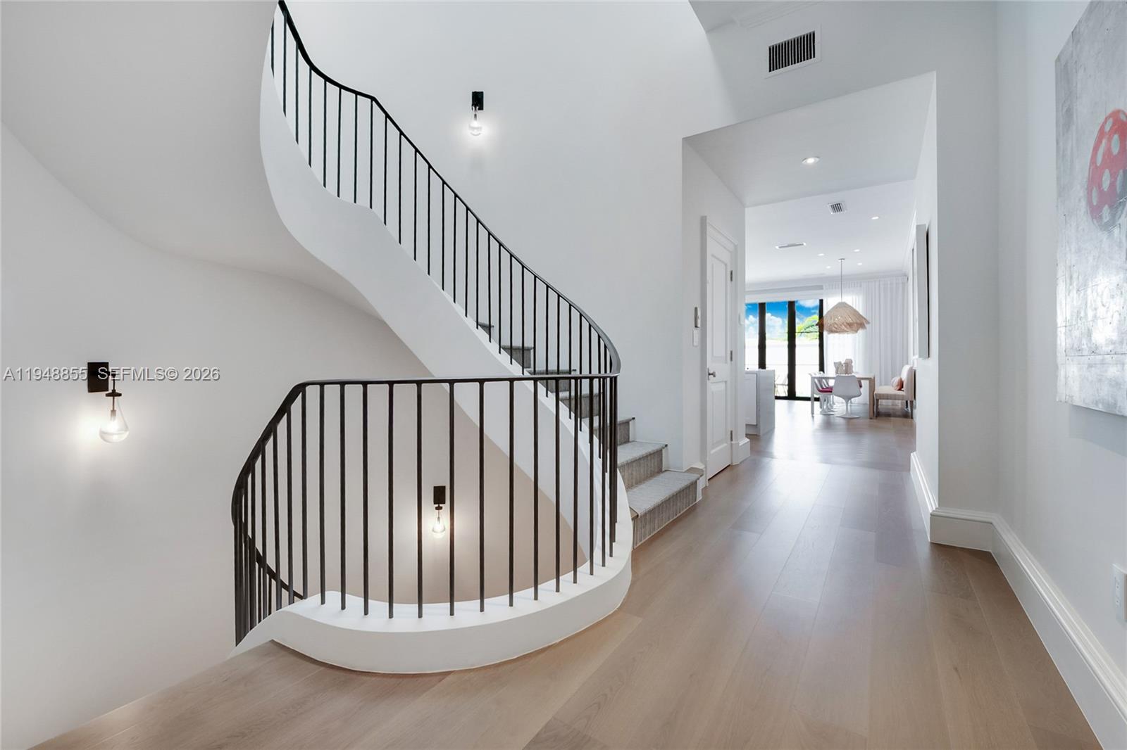 2615 Anderson Road Coral Gables, FL 33134 - Photo 14 of 28 a view of entryway and hall with wooden floor