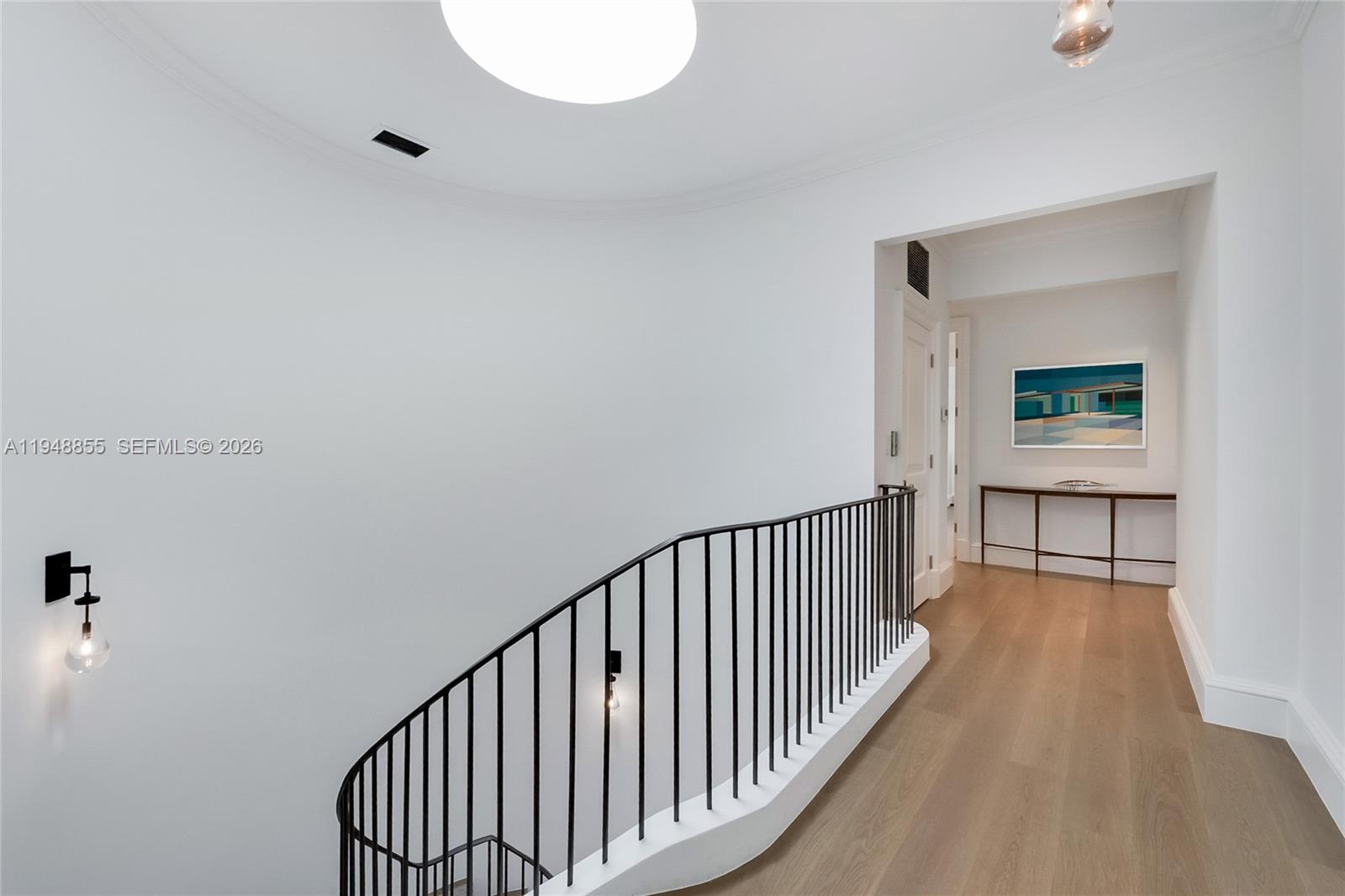 2615 Anderson Road Coral Gables, FL 33134 - Photo 15 of 28 a view of a hallway with wooden floor