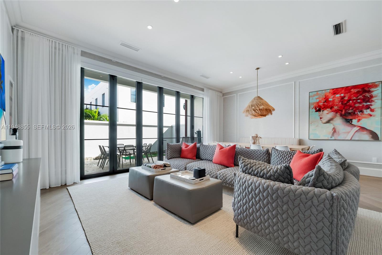 2615 Anderson Road Coral Gables, FL 33134 - Photo 4 of 28 a living room with furniture and a large window