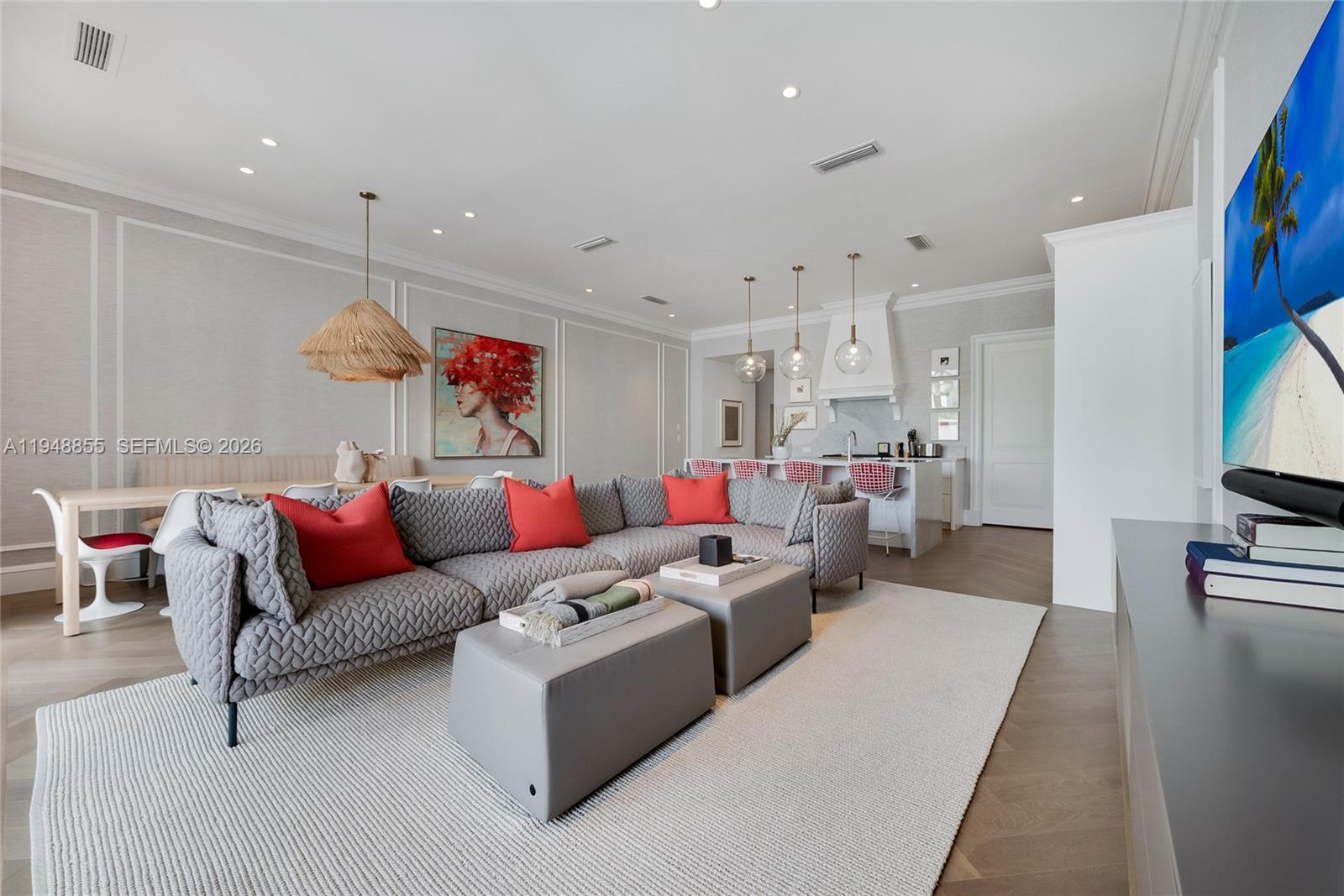 2615 Anderson Road Coral Gables, FL 33134 - Photo 5 of 28 a living room with furniture kitchen view and a flat screen tv