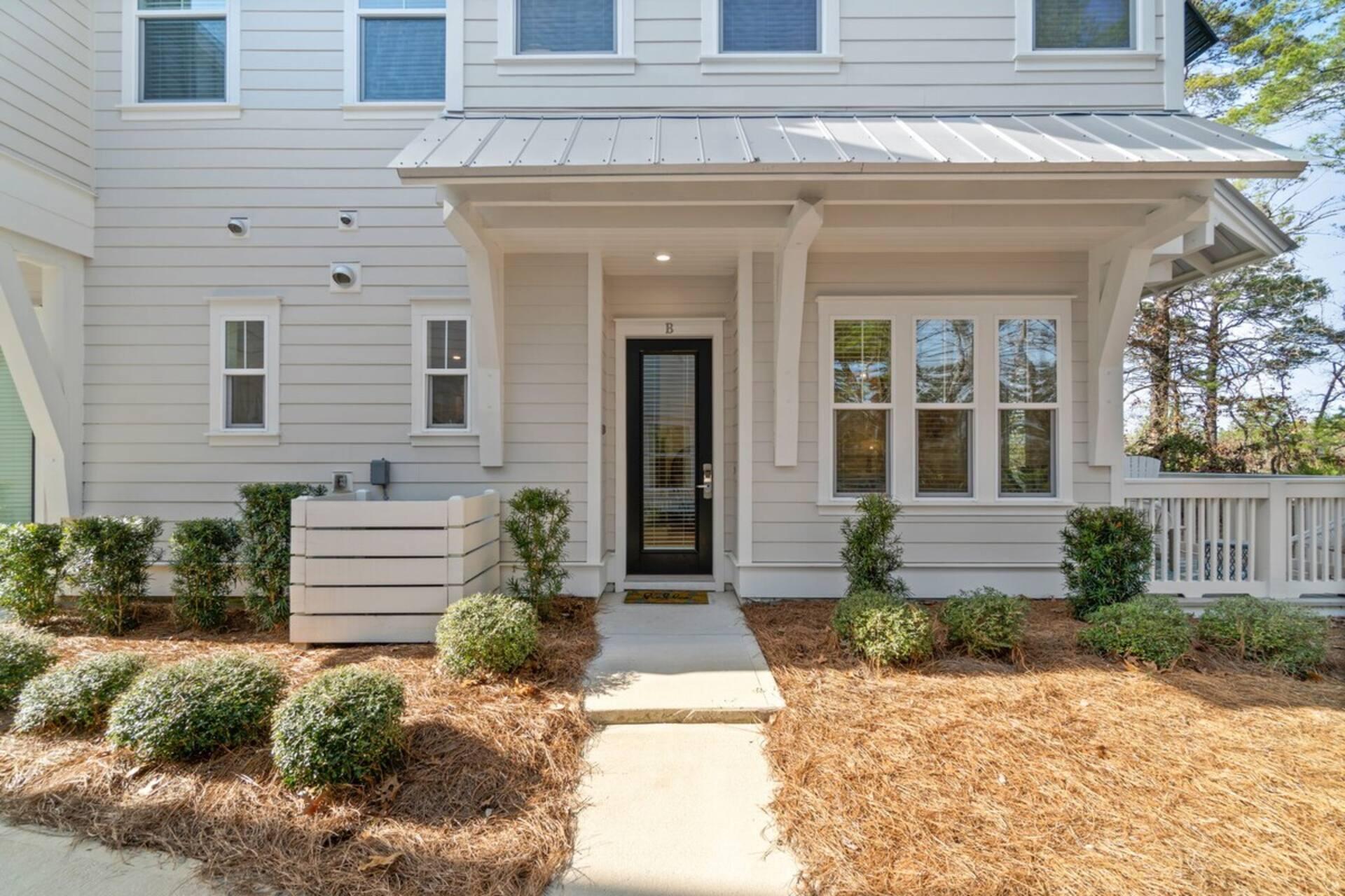 146 East E Pine, Unit B Inlet Beach, FL 32461 - Photo 33 of 47 a front view of a house