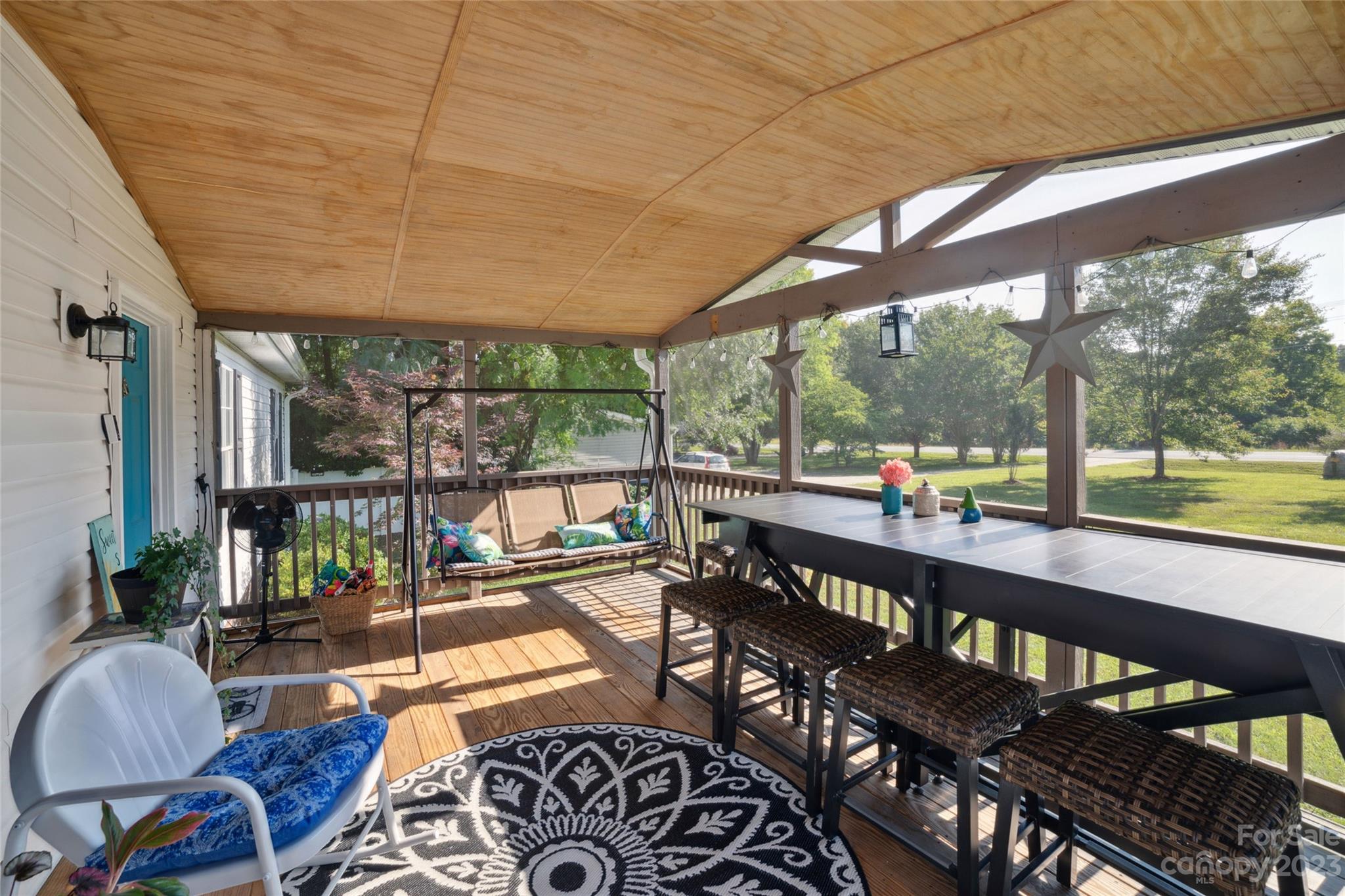 235 Amity Church Road Iron Station, NC 28080 - Photo 18 of 25 a living room with large windows