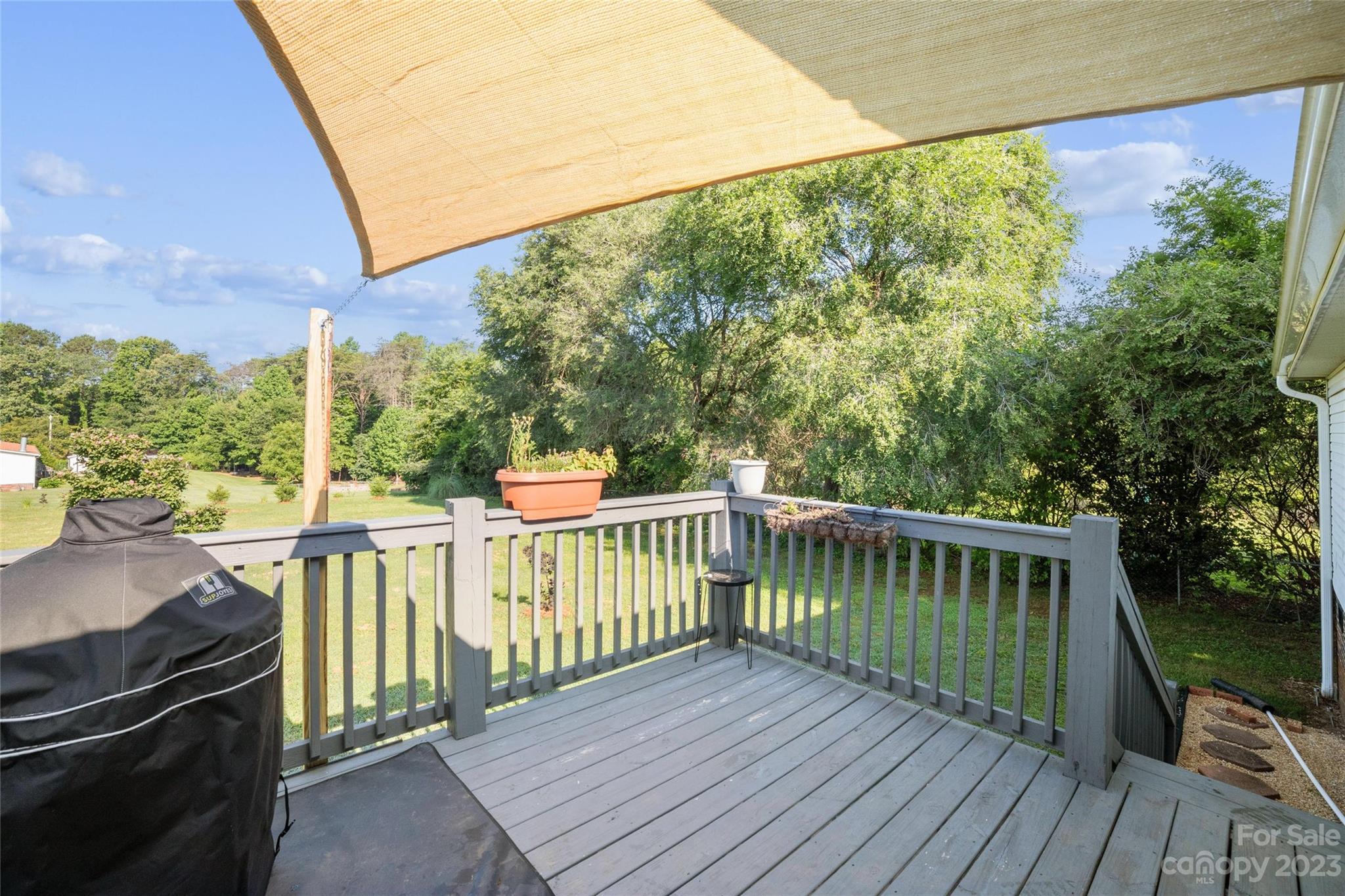 235 Amity Church Road Iron Station, NC 28080 - Photo 20 of 25 a view of balcony with furniture and wooden floor