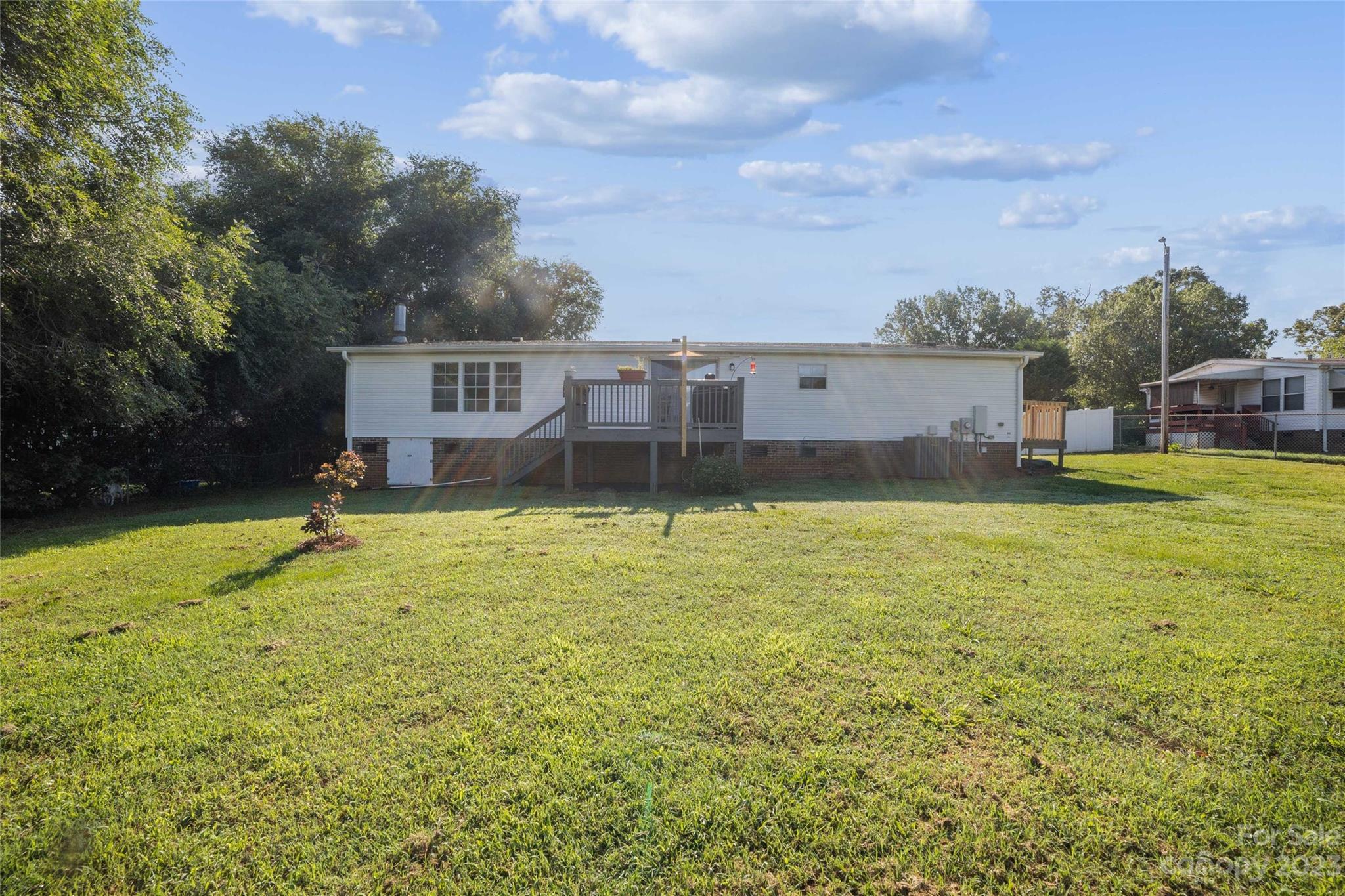 235 Amity Church Road Iron Station, NC 28080 - Photo 25 of 25 a view of a house with a yard
