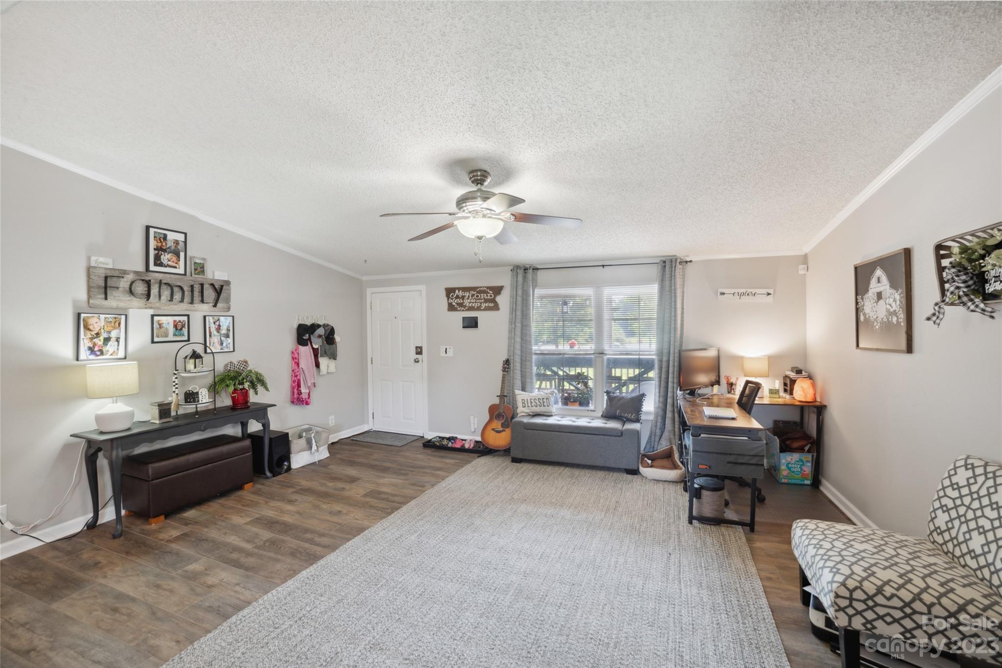 235 Amity Church Road Iron Station, NC 28080 - Photo 5 of 25 a living room with furniture