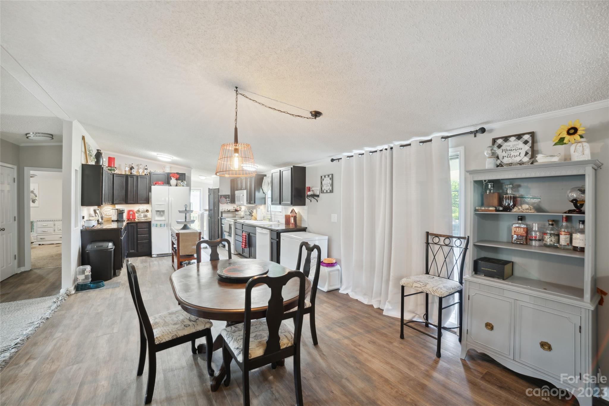 235 Amity Church Road Iron Station, NC 28080 - Photo 6 of 25 a dining room with furniture and window