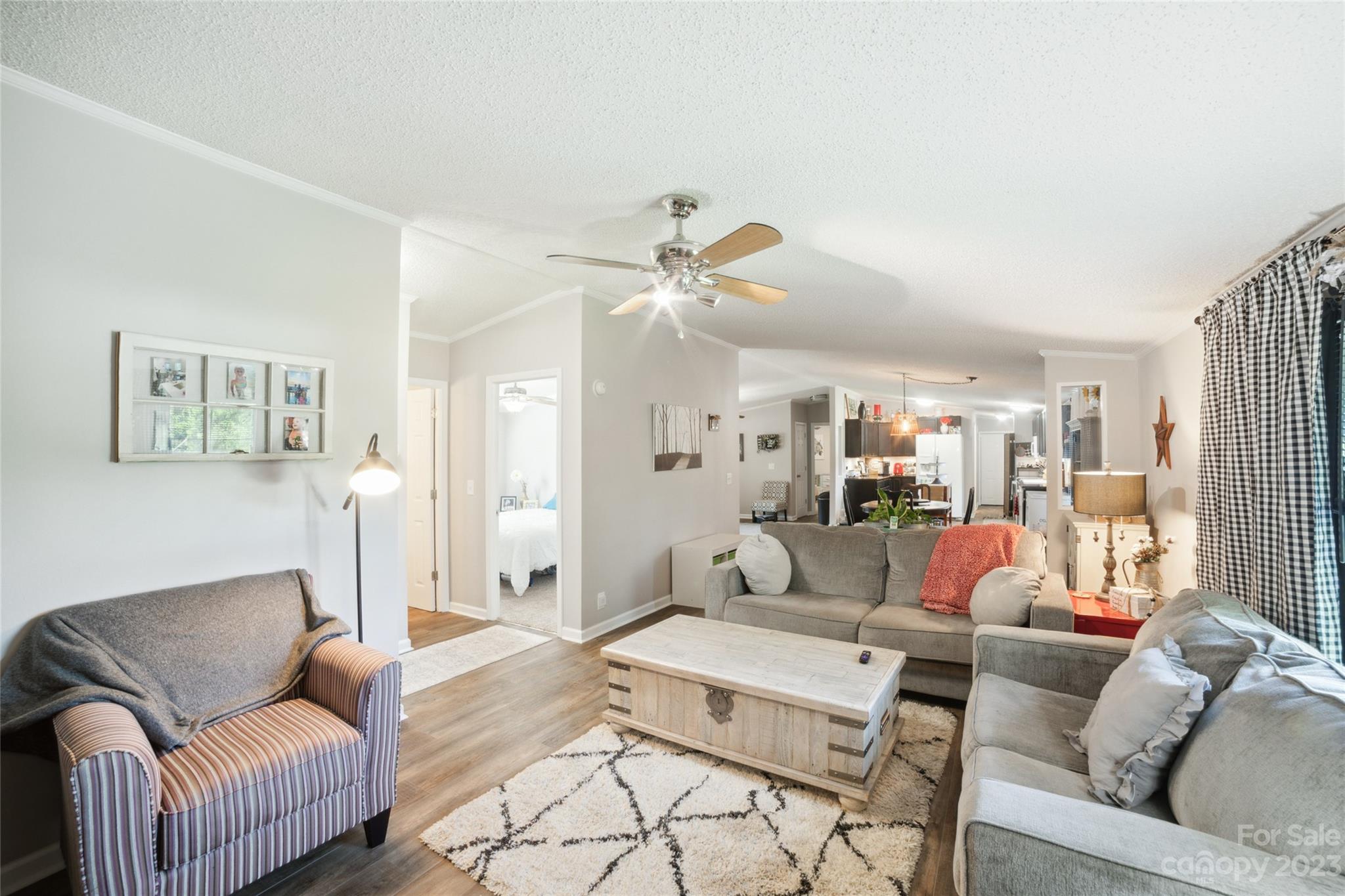235 Amity Church Road Iron Station, NC 28080 - Photo 9 of 25 a living room with furniture
