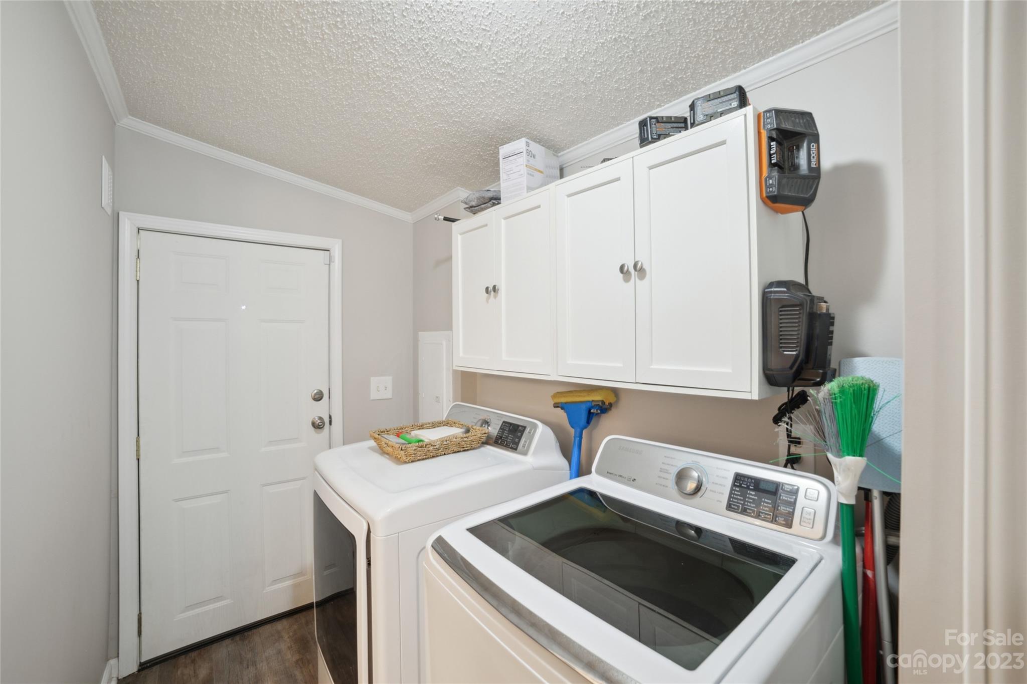 235 Amity Church Road Iron Station, NC 28080 - Photo 10 of 25 a utility room with dryer and washer