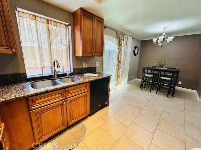 7304 Exeter Street, Unit E Paramount, CA 90723 - Photo 2 of 36 Second shot of the kitchen and dining area, with the sliding glass door leading to the outdoor patio on your left.