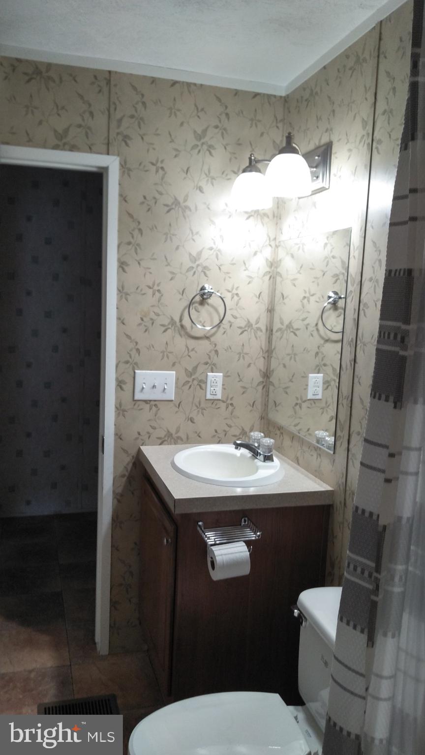 510 School Road Denver, PA 17517 - Photo 8 of 14 a bathroom with a sink toilet and shower