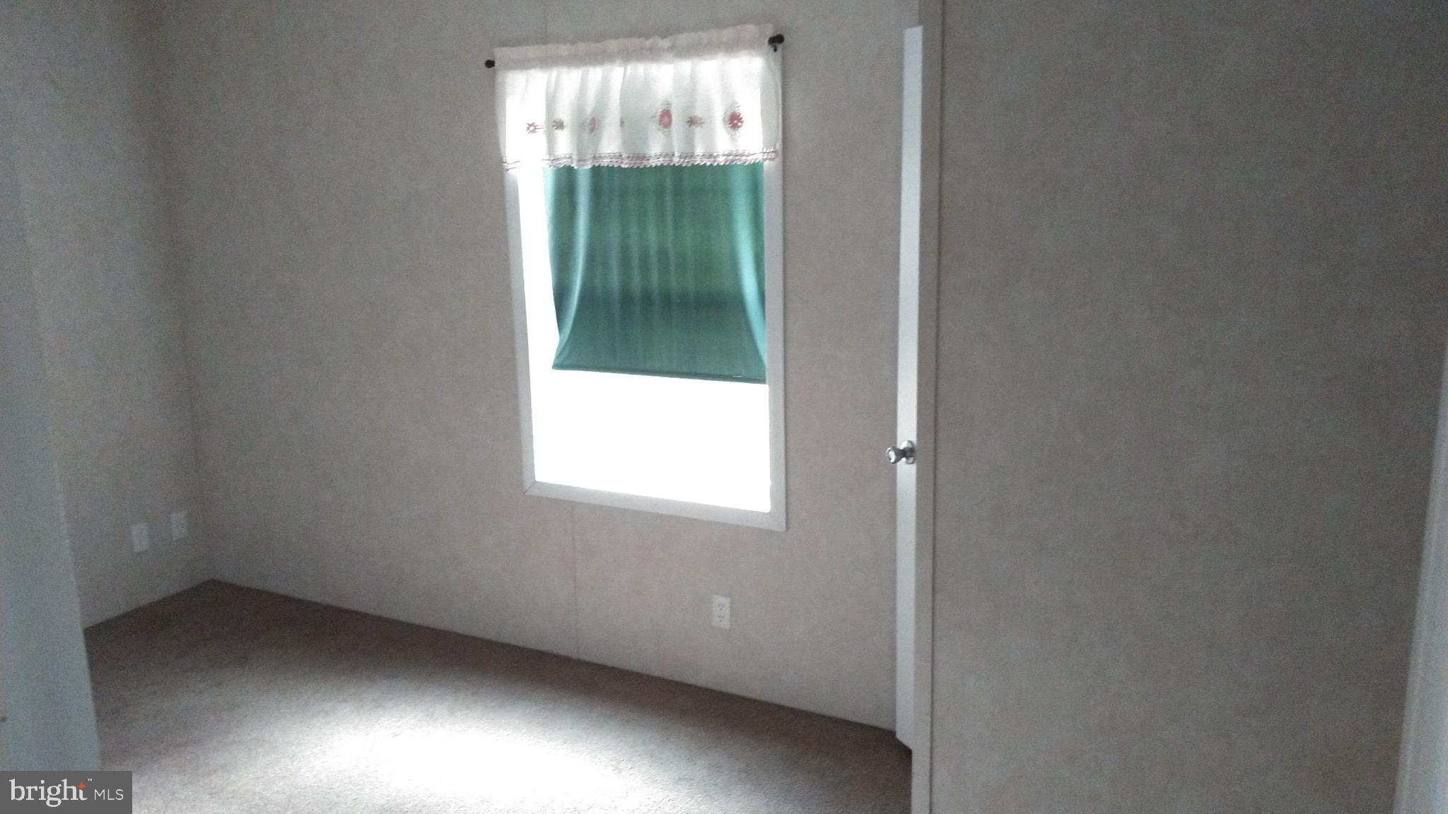 510 School Road Denver, PA 17517 - Photo 10 of 14 a view of an empty room with a window