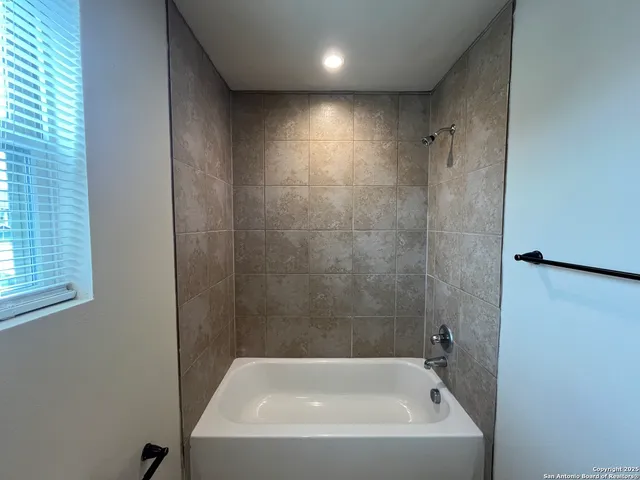 a bathroom with a bathtub