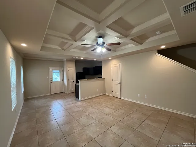 a view of a livingroom and a kitchen