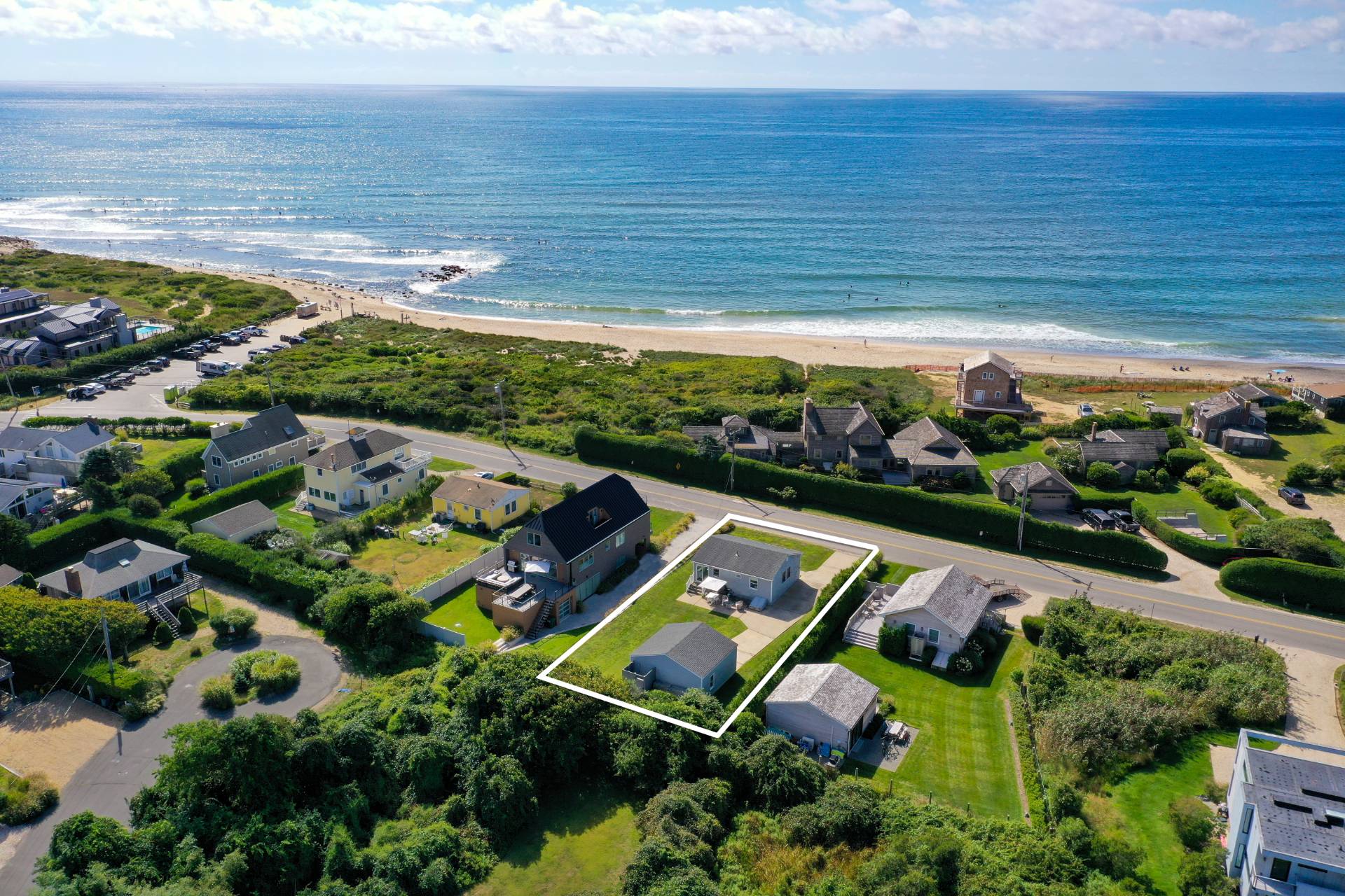 an aerial view of house with yard swimming pool and outdoor seating