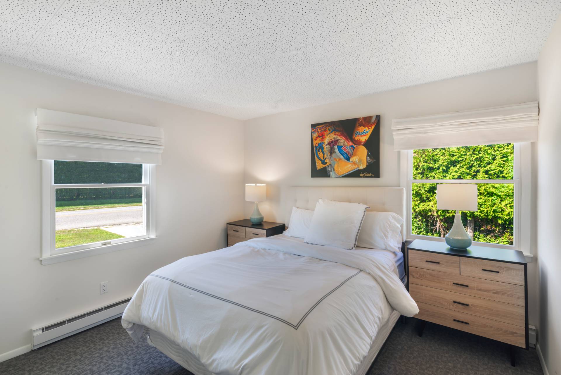 19 Deforest Road Montauk, NY 11954 - Photo 12 of 20 a bedroom with a bed and a window