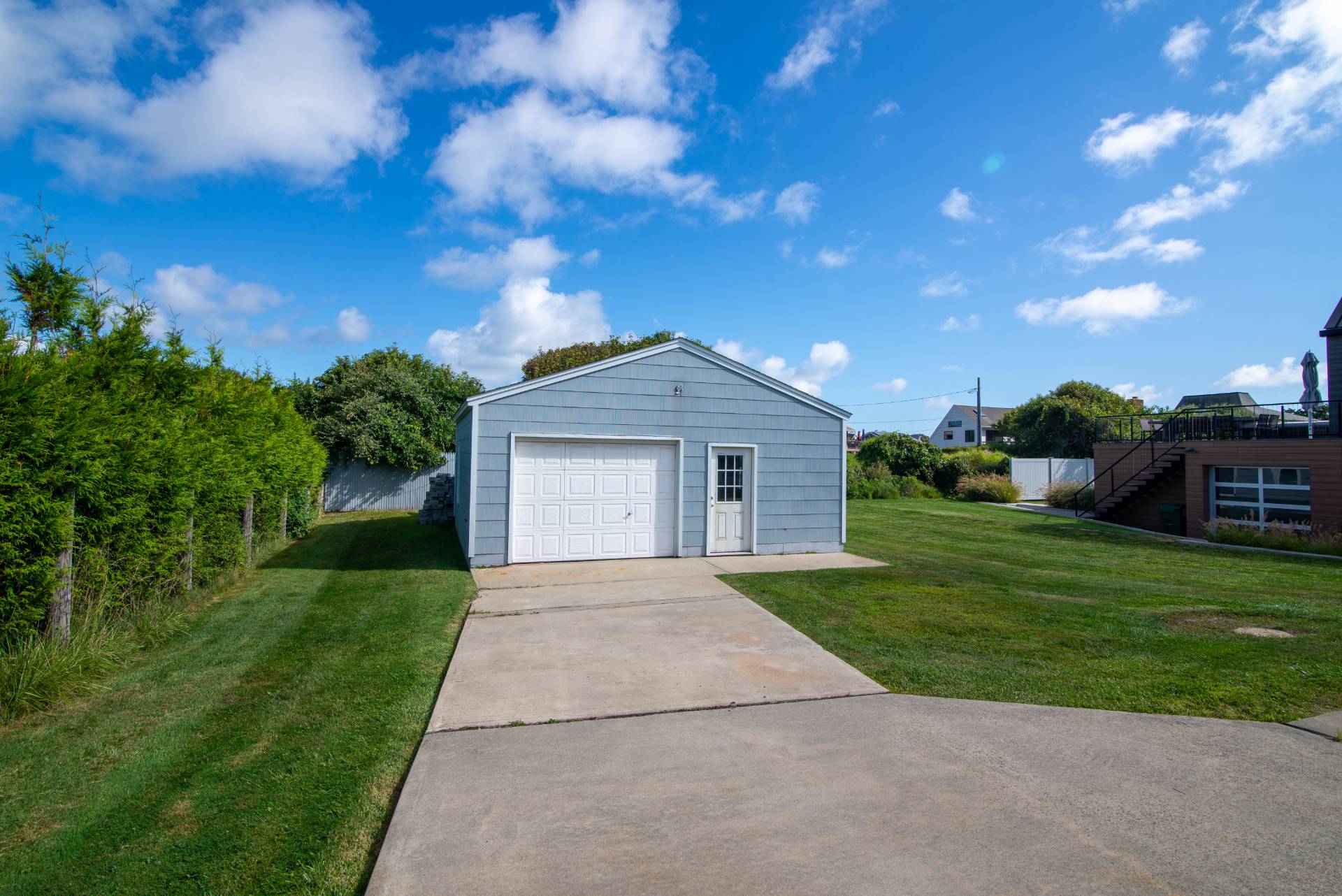 19 Deforest Road Montauk, NY 11954 - Photo 17 of 20 a front view of a house with yard