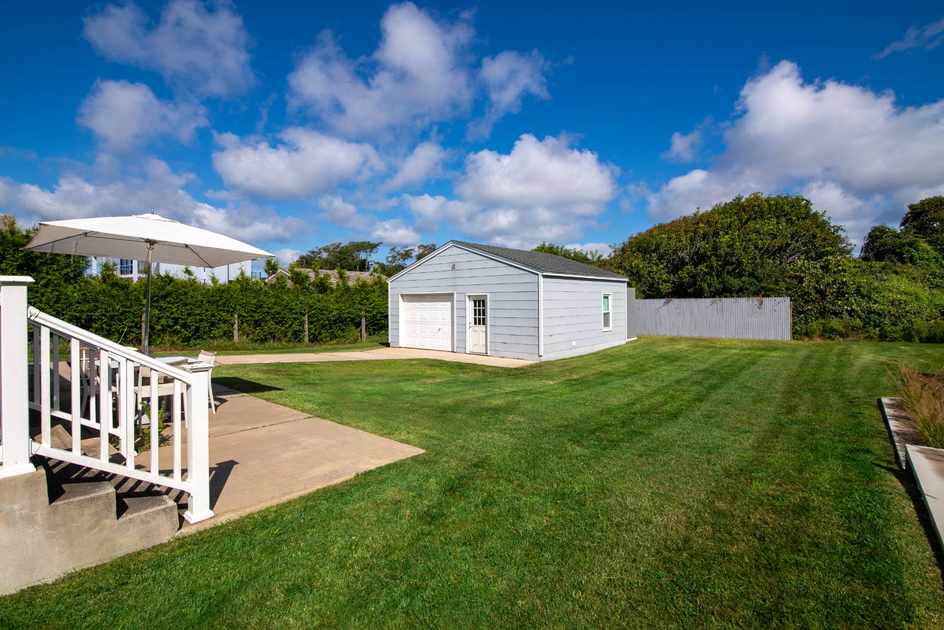 19 Deforest Road Montauk, NY 11954 - Photo 6 of 20 a view of a backyard with sitting area