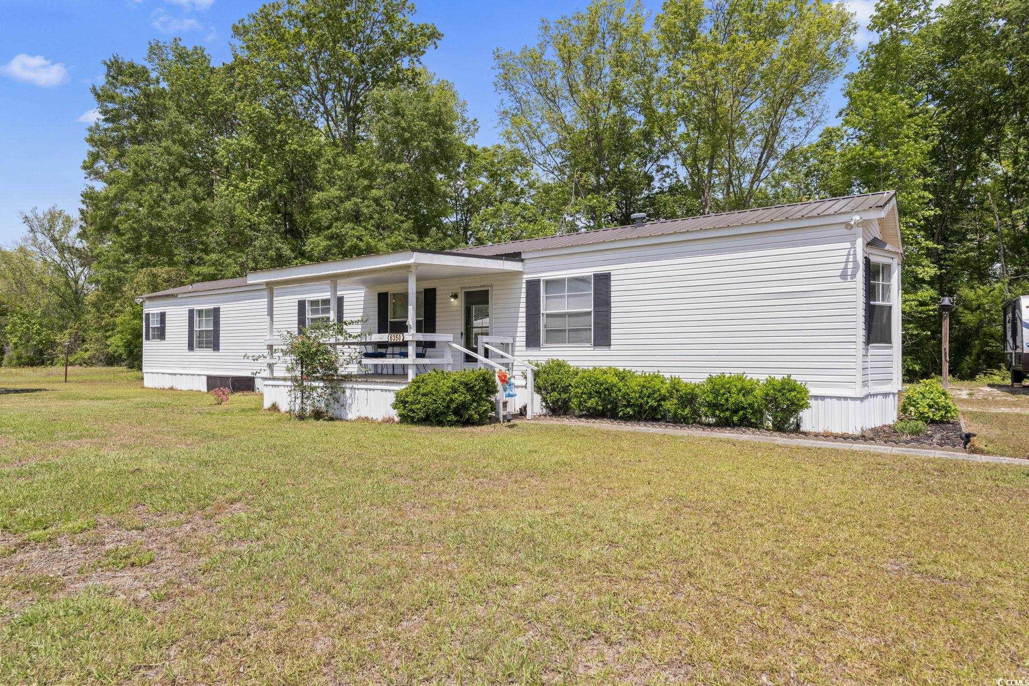 6350 Antioch Road Conway, SC 29527 - Photo 1 of 23 Manufactured / mobile home featuring a front lawn