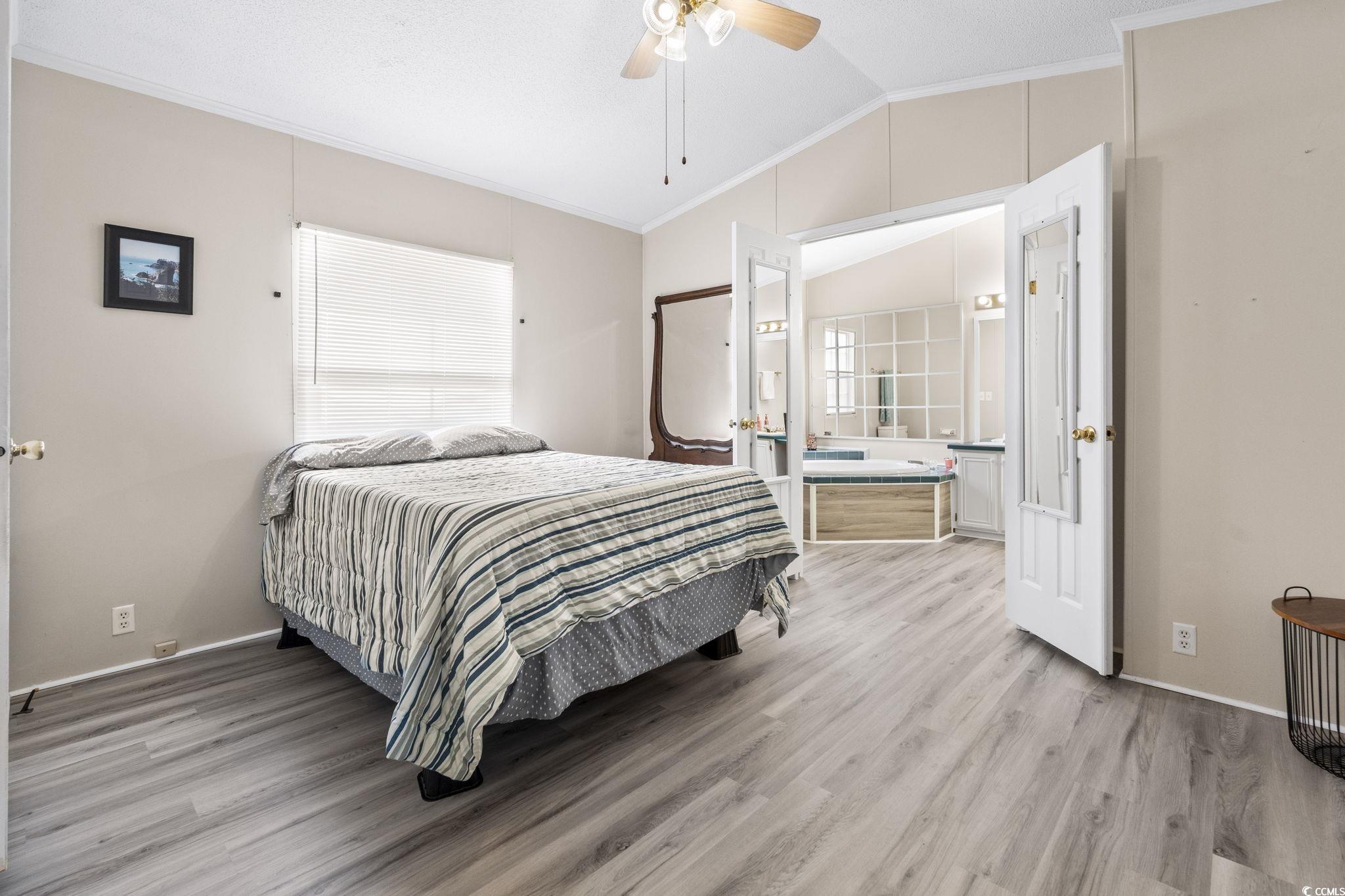 6350 Antioch Road Conway, SC 29527 - Photo 12 of 23 Bedroom featuring light wood finished floors, ceil