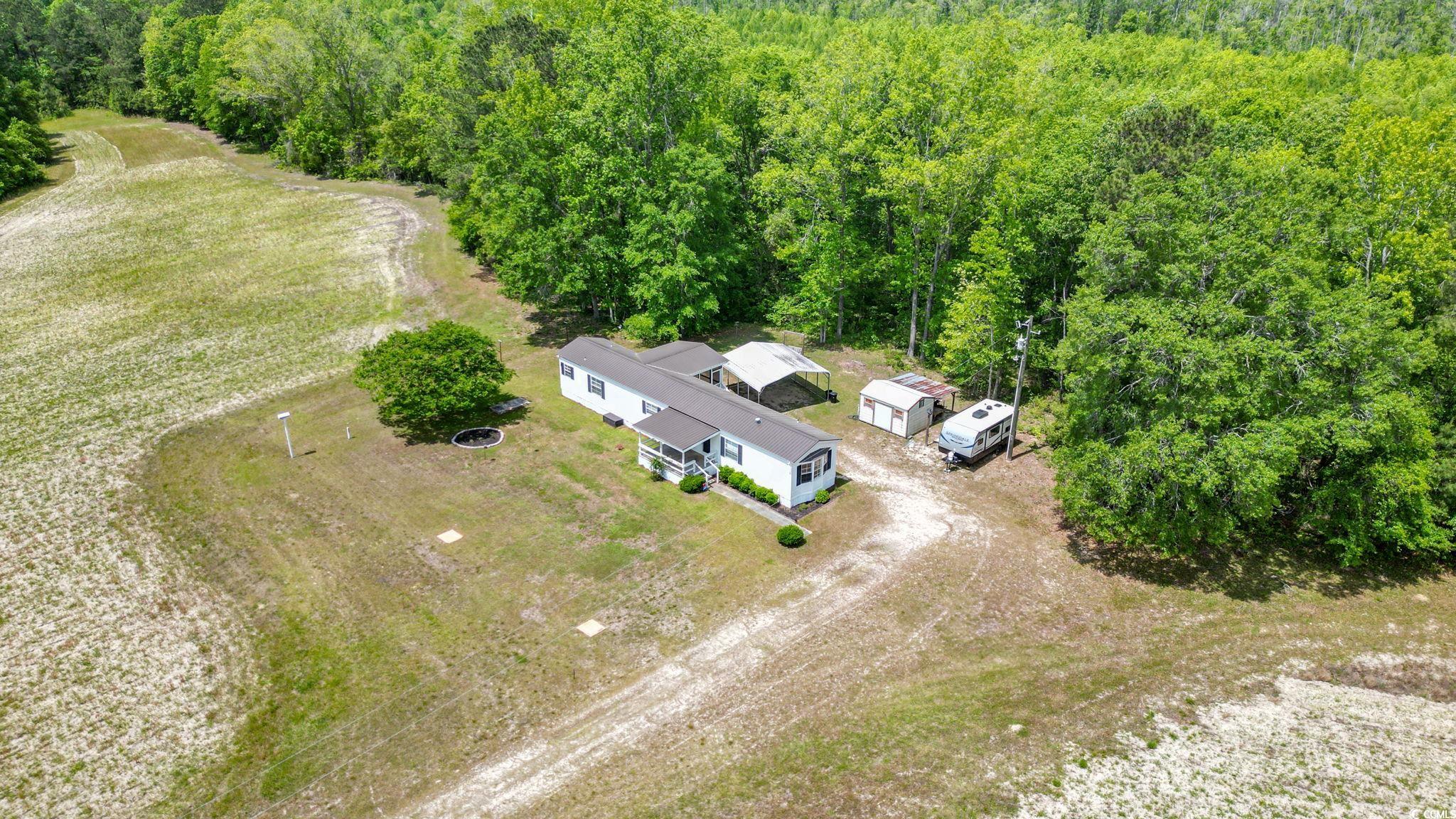 6350 Antioch Road Conway, SC 29527 - Photo 2 of 23 Drone / aerial view with a forest view