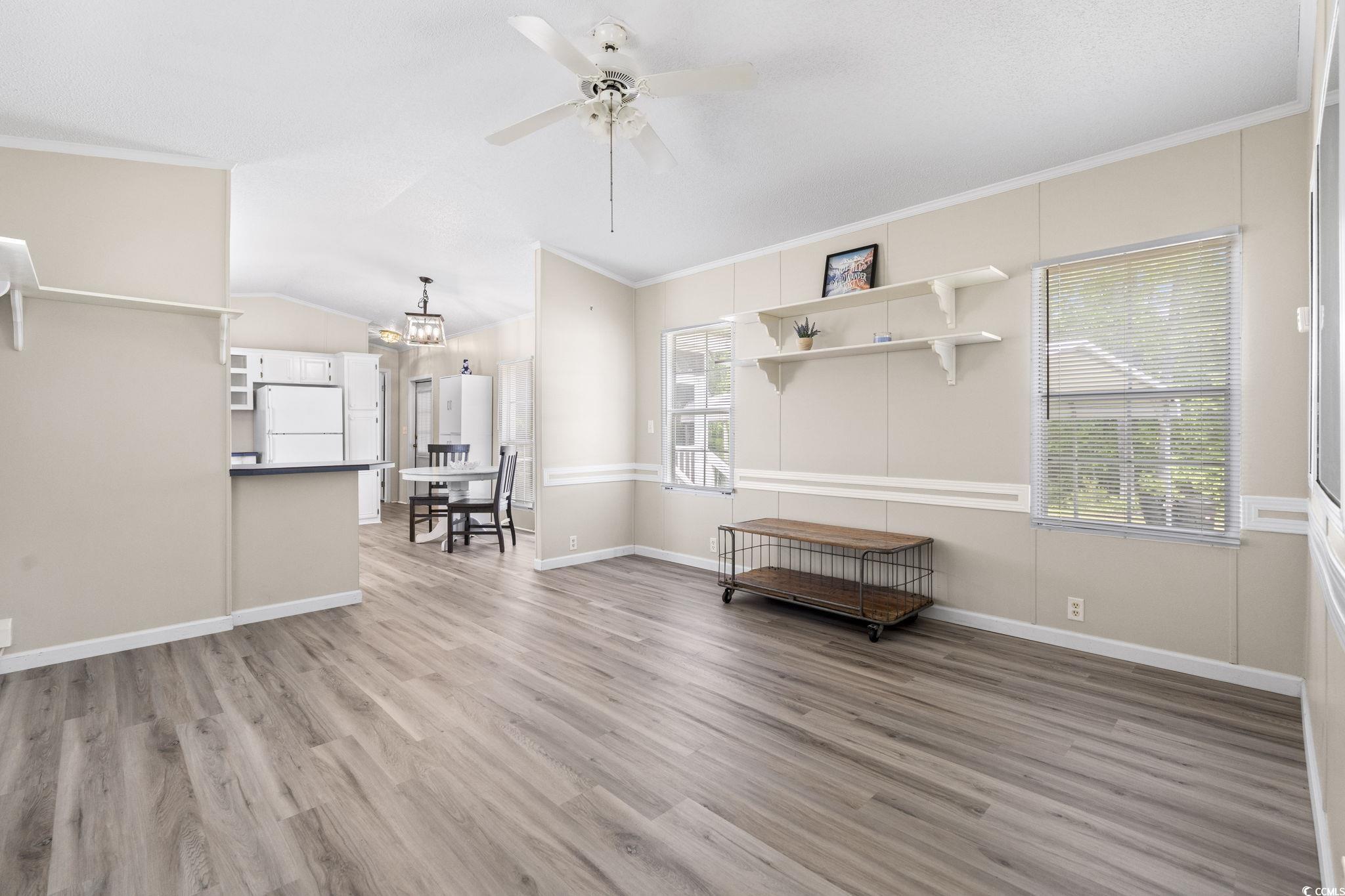 6350 Antioch Road Conway, SC 29527 - Photo 6 of 23 Living room with light wood-style flooring, basebo