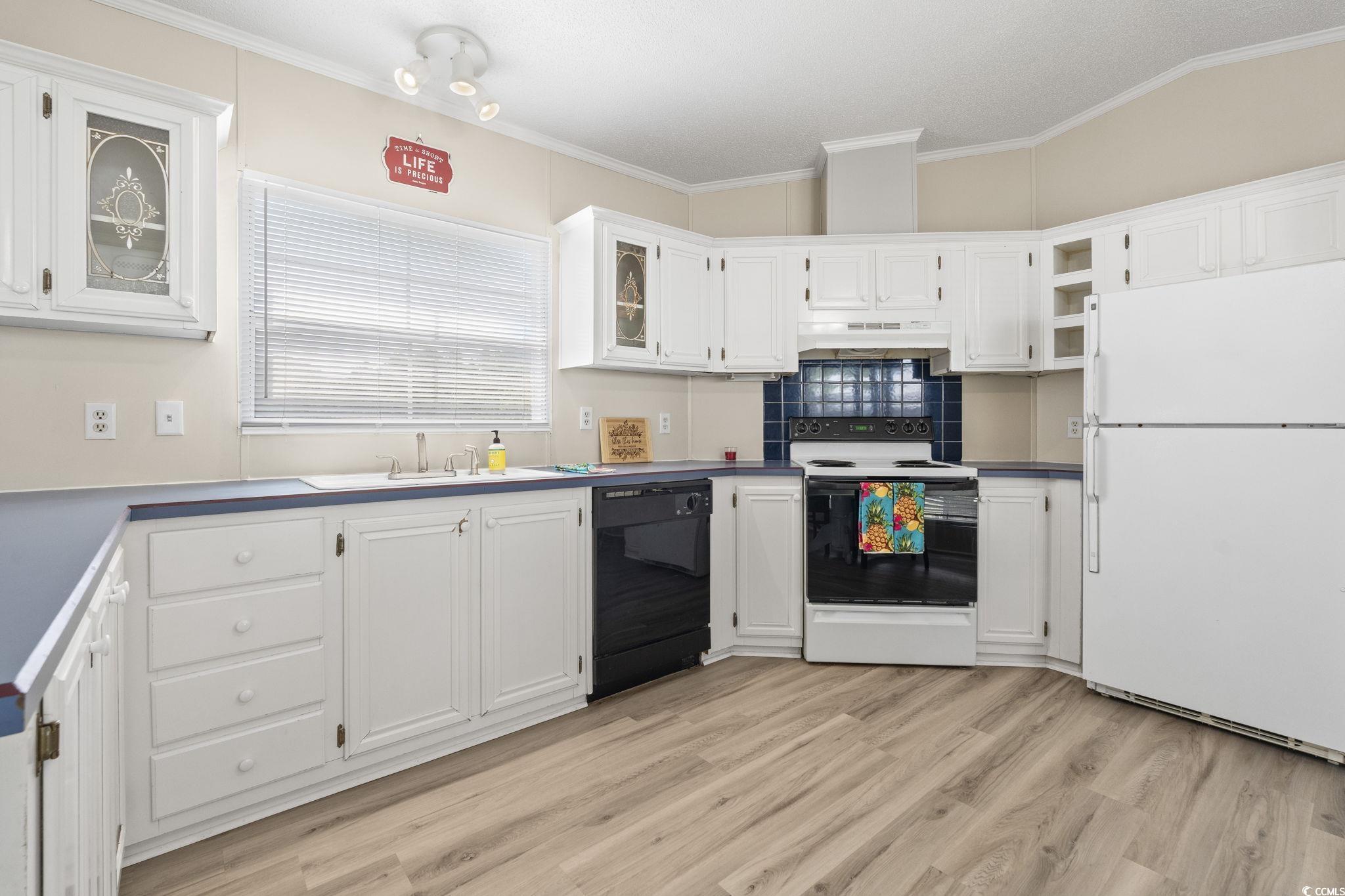 6350 Antioch Road Conway, SC 29527 - Photo 8 of 23 Kitchen featuring a sink, dishwasher, electric ran