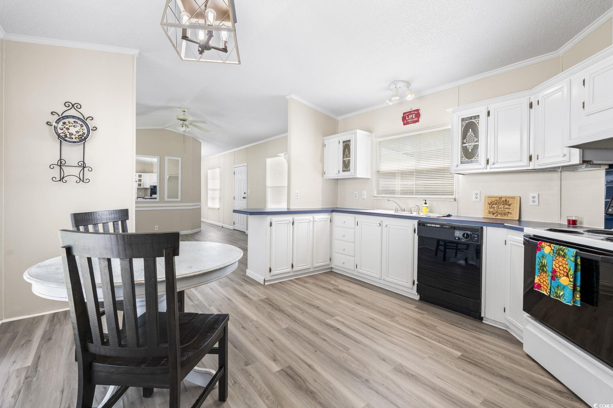 6350 Antioch Road Conway, SC 29527 - Photo 9 of 23 Kitchen featuring white electric range oven, ceili
