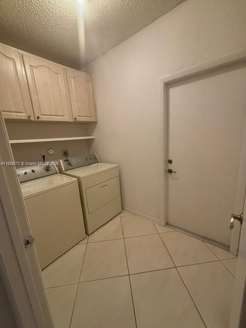 12149 Quilting Lane Boca Raton, FL 33428 - Photo 11 of 36 a utility room with dryer and washer
