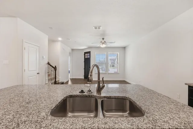 a sink with granite countertop a sink and a granite top