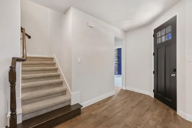 a view of an entryway with staircase