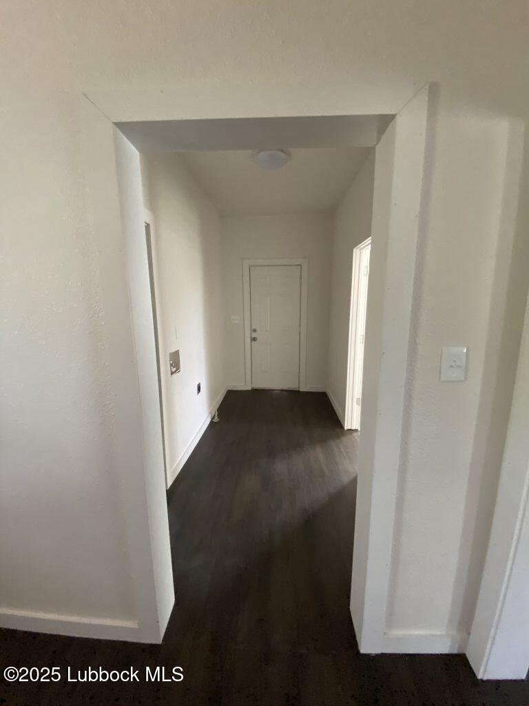 225 South 11th Street Slaton, TX 79364 - Photo 13 of 20 Hall-Washer-Drayer-back-door-768x1024