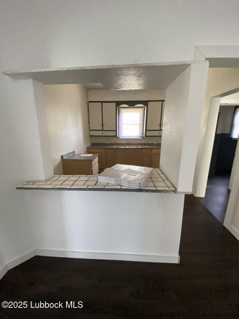 225 South 11th Street Slaton, TX 79364 - Photo 5 of 20 Dining-Room-Looking-Into-Kitchen-768x102