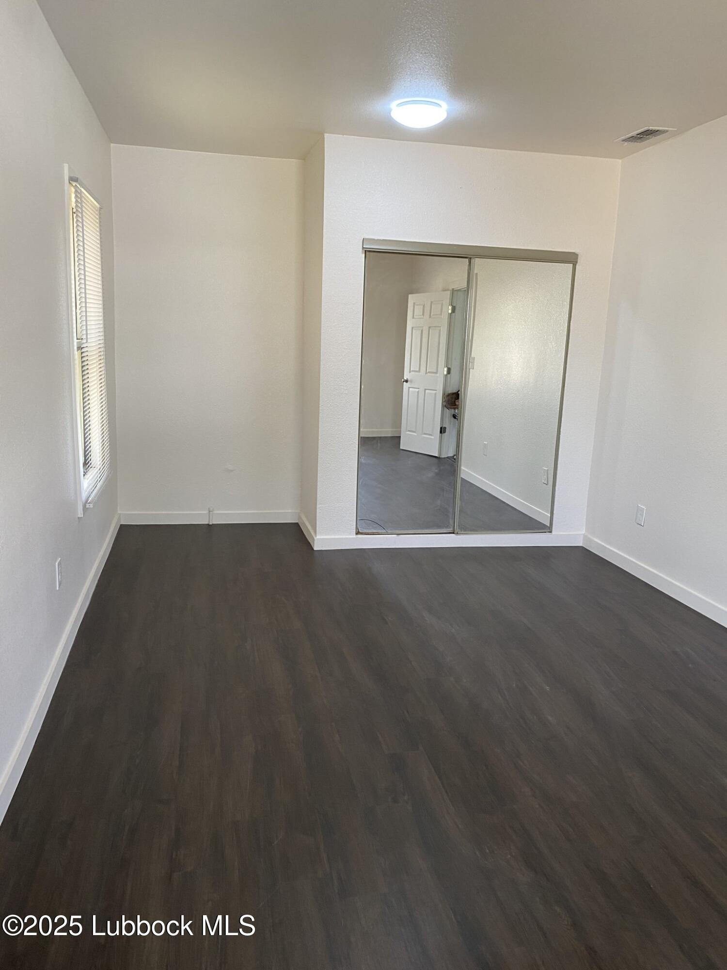 225 South 11th Street Slaton, TX 79364 - Photo 10 of 20 Master-Bedroom-West-End-1536x2048