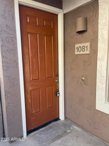 a view of front door with a door