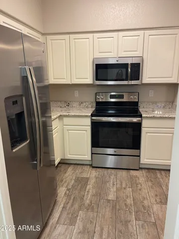 a utility room with washer and dryer