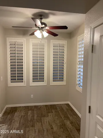 a kitchen with a sink and steel appliances