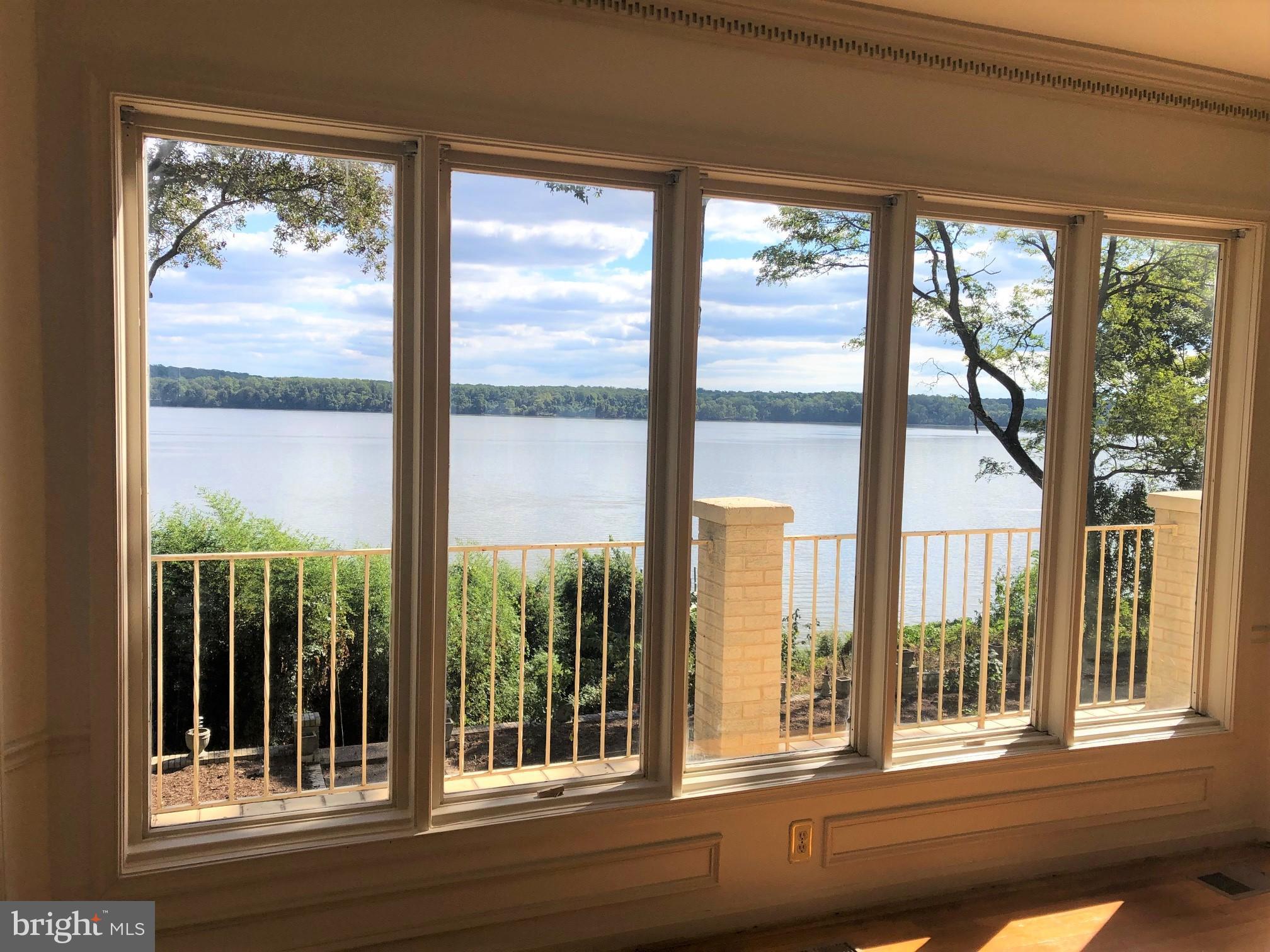 3901 Belle Rive Terrace Alexandria, VA 22309 - Photo 12 of 16 a view of a glass door with a tree