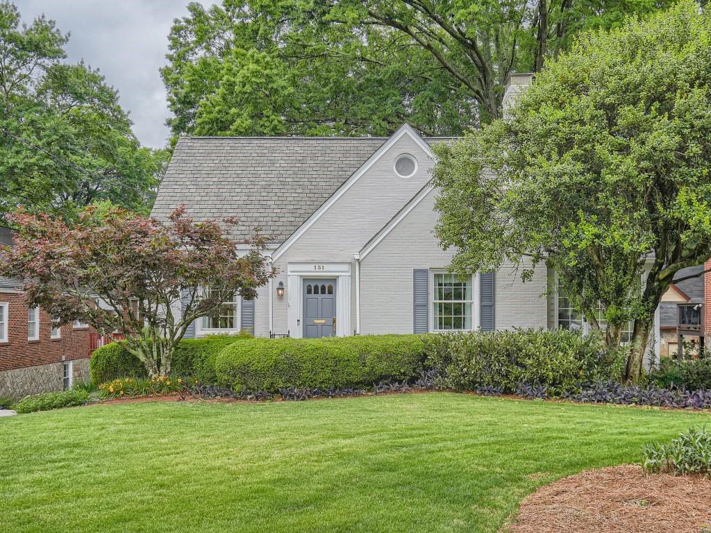 131 Vidal Boulevard Decatur, GA 30030 - Photo 1 of 1 a house that has a tree in front of a house