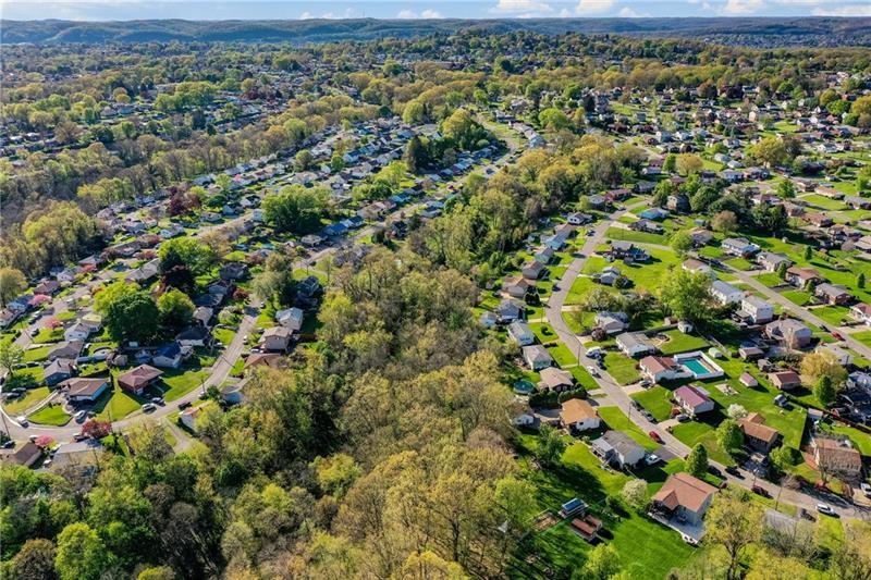0 Forest View Lower Burrell, PA 15068 - Photo 2 of 2 an aerial view of residential houses with outdoor space and trees