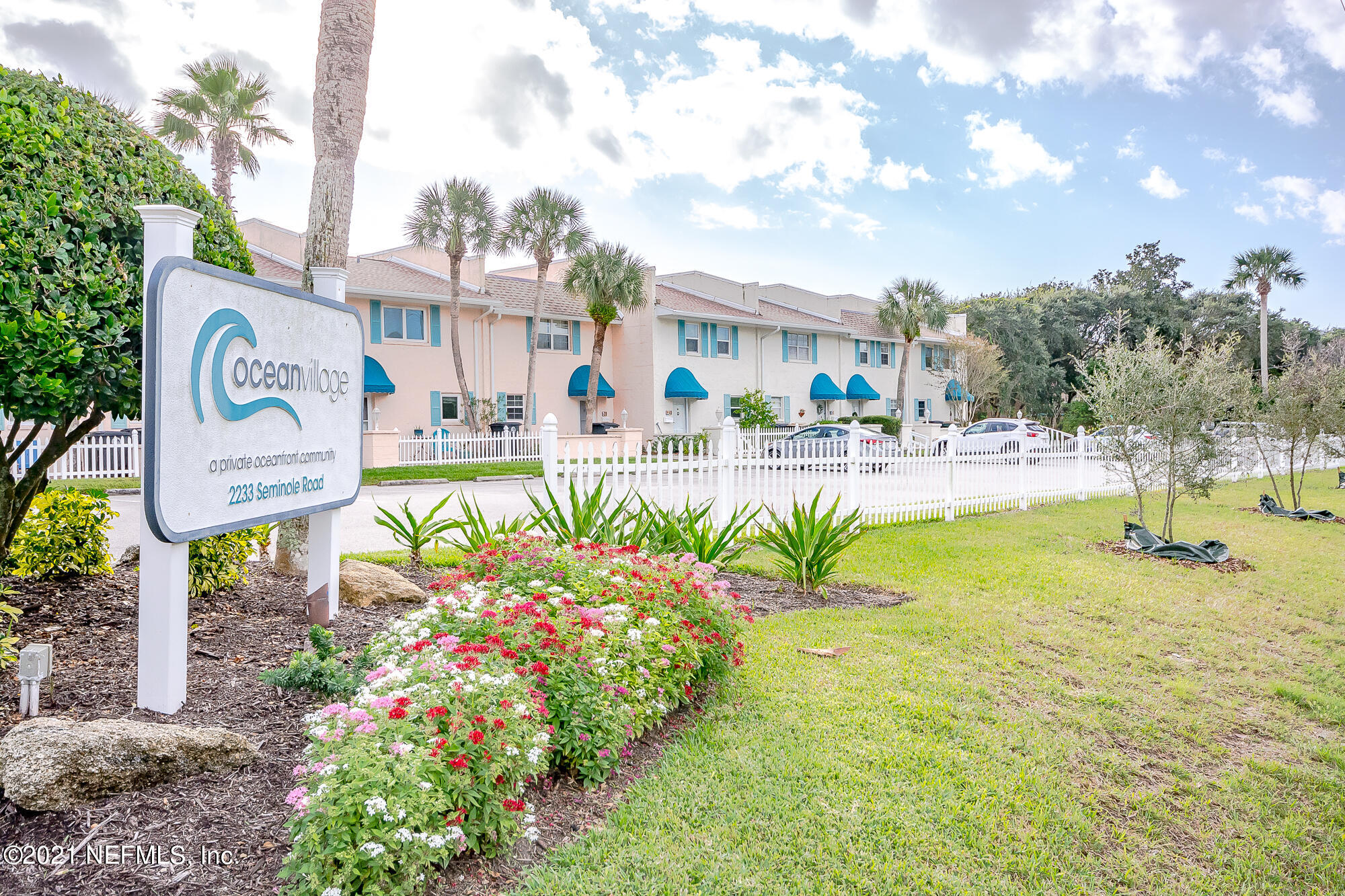 2233 Seminole Road, Unit 42 Atlantic Beach, FL 32233 - Photo 3 of 40 a street view with sitting space