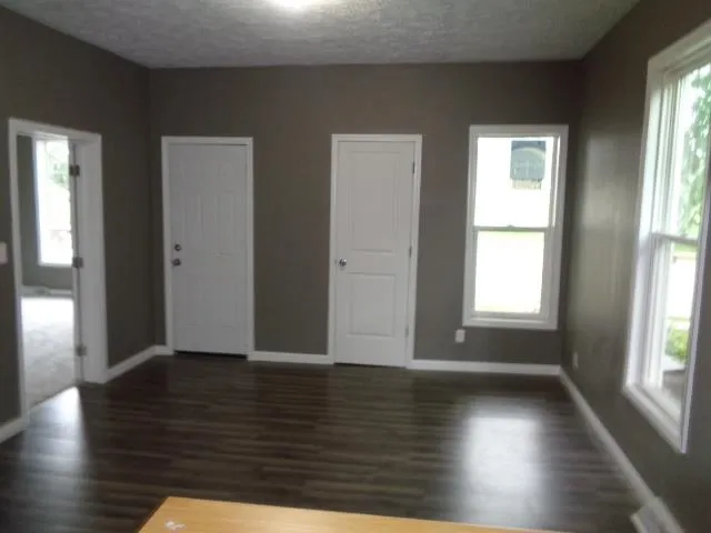 an empty room that has a window